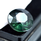 5.40 carat round-cut deep green sapphire, a natural certified loose gemstone